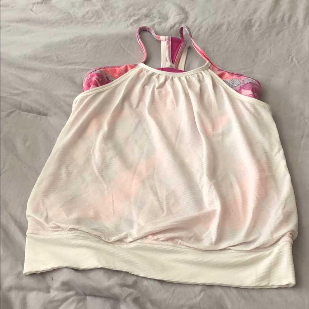 Beautiful white Ivivva top with pink lining